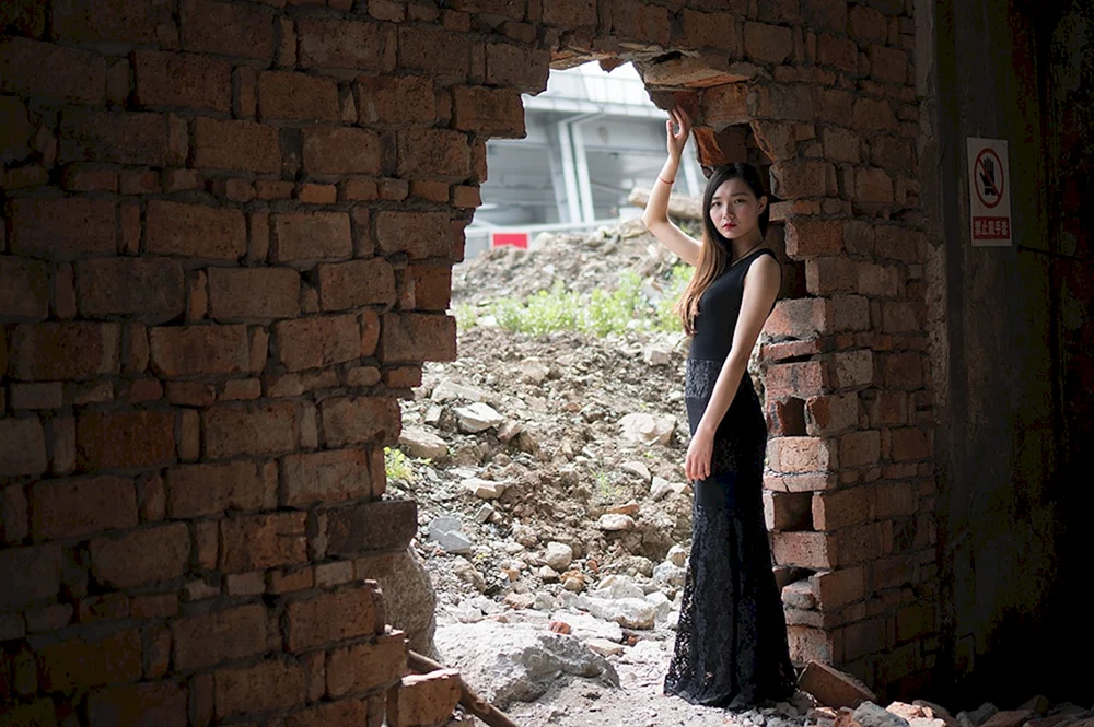 Asian girl Brick Wall