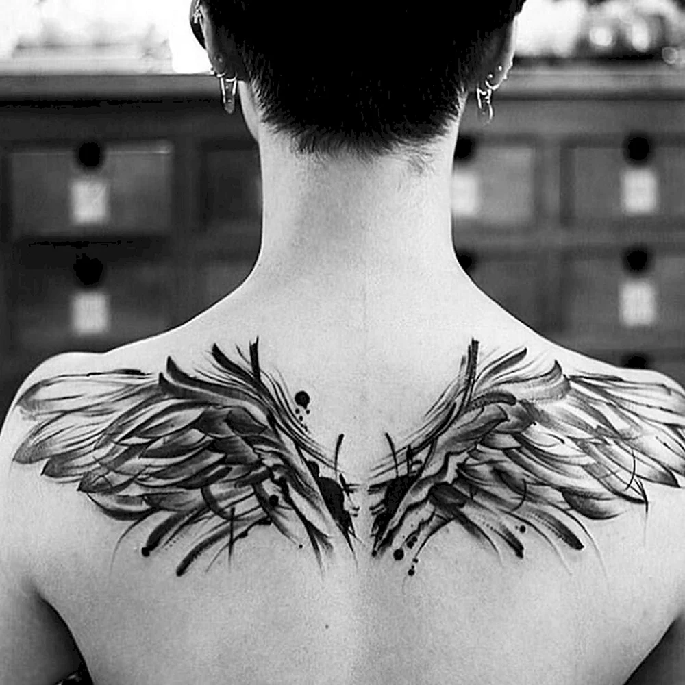 Blackwork Wings Tattoo