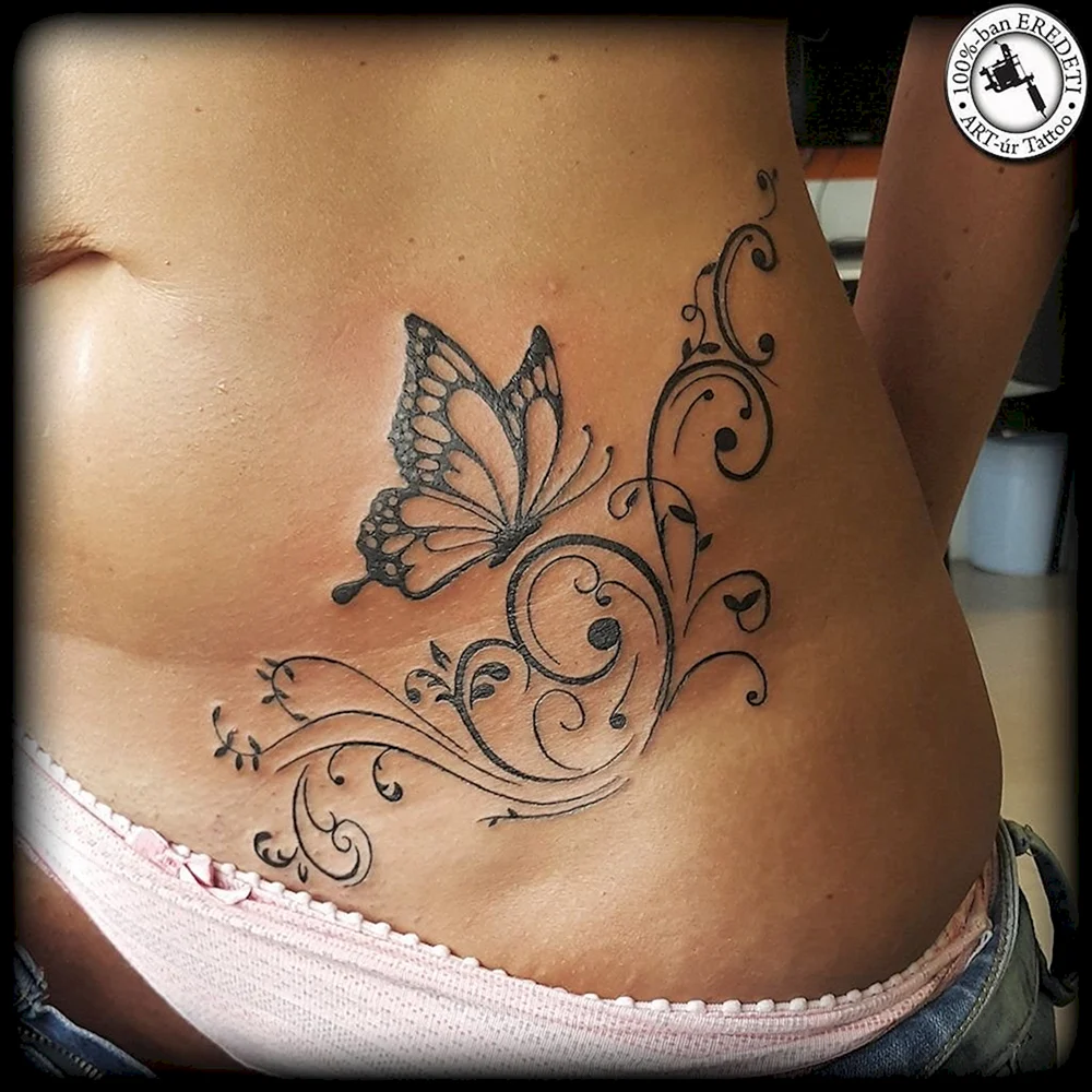Butterfly Tattoo on belly