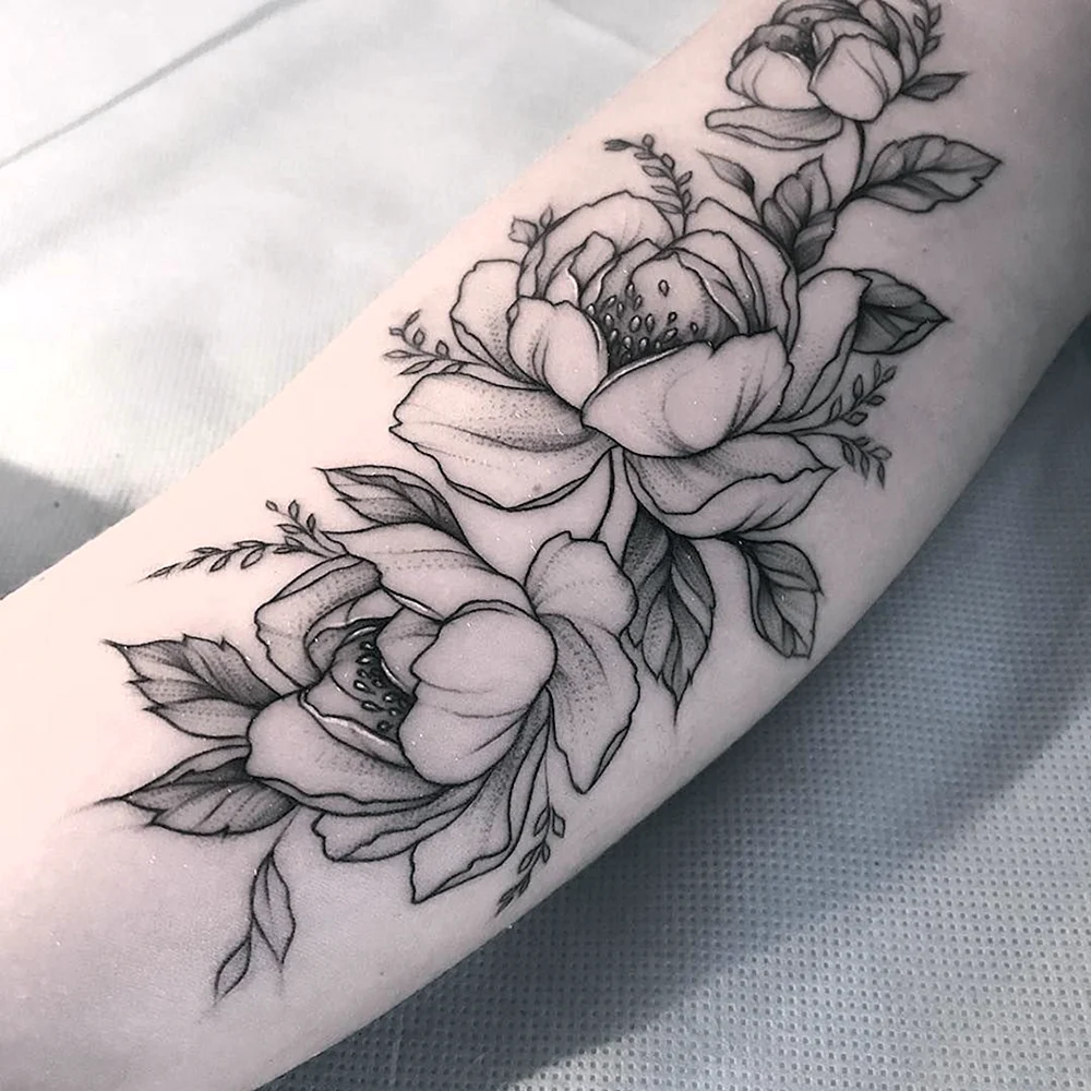 Flores Tattoo