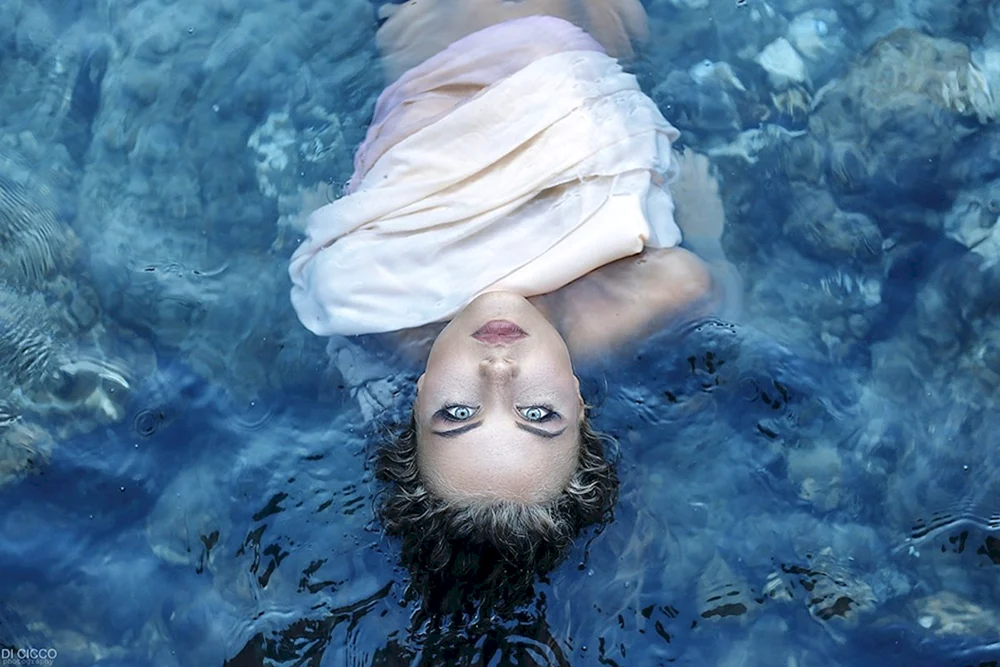 Girl lying in Water