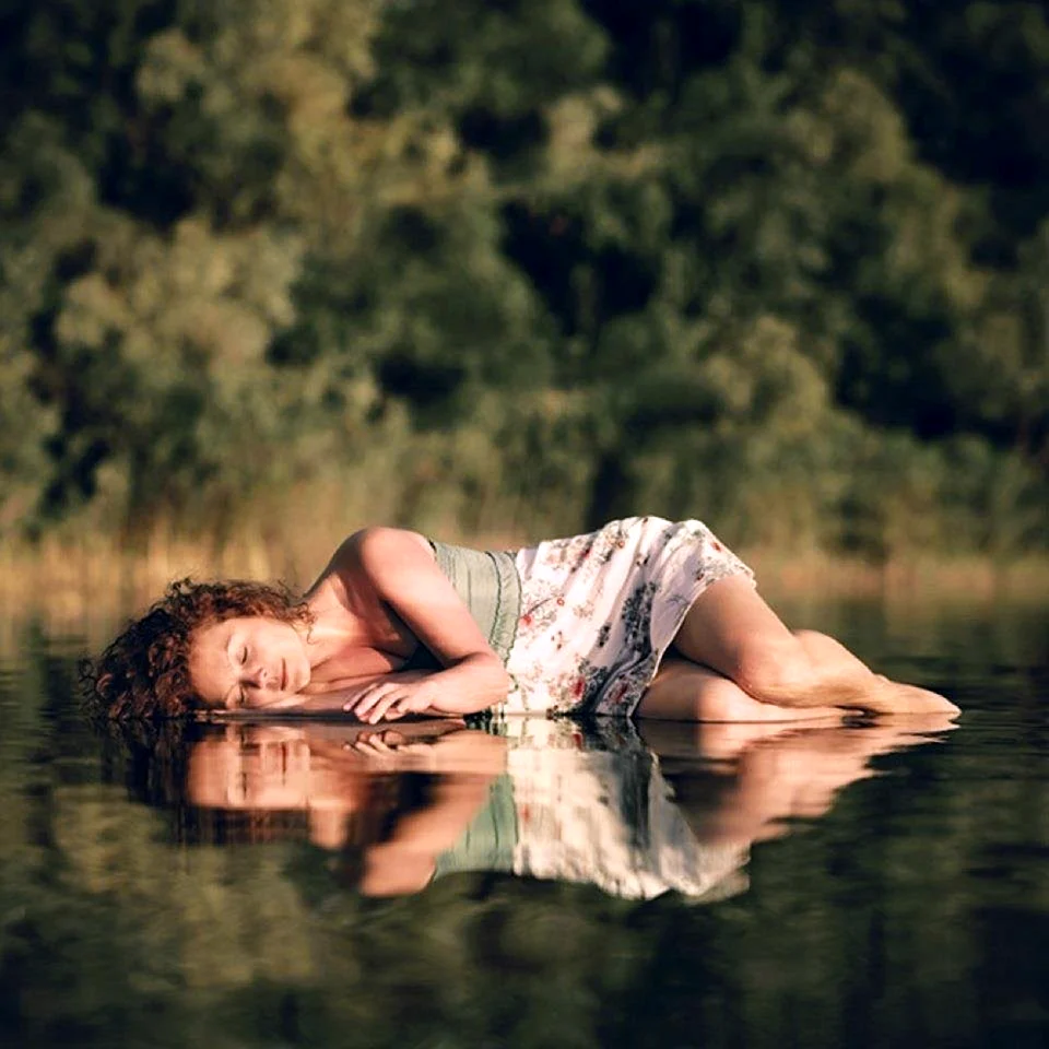 Girl lying on Water