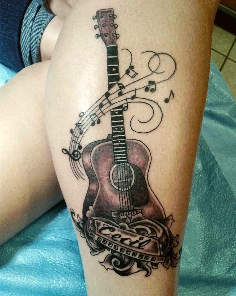 Handsome Tattooed guitarist