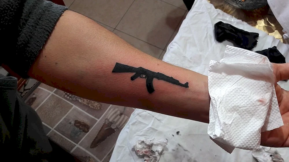 Kalashnikov Neck Tattoo