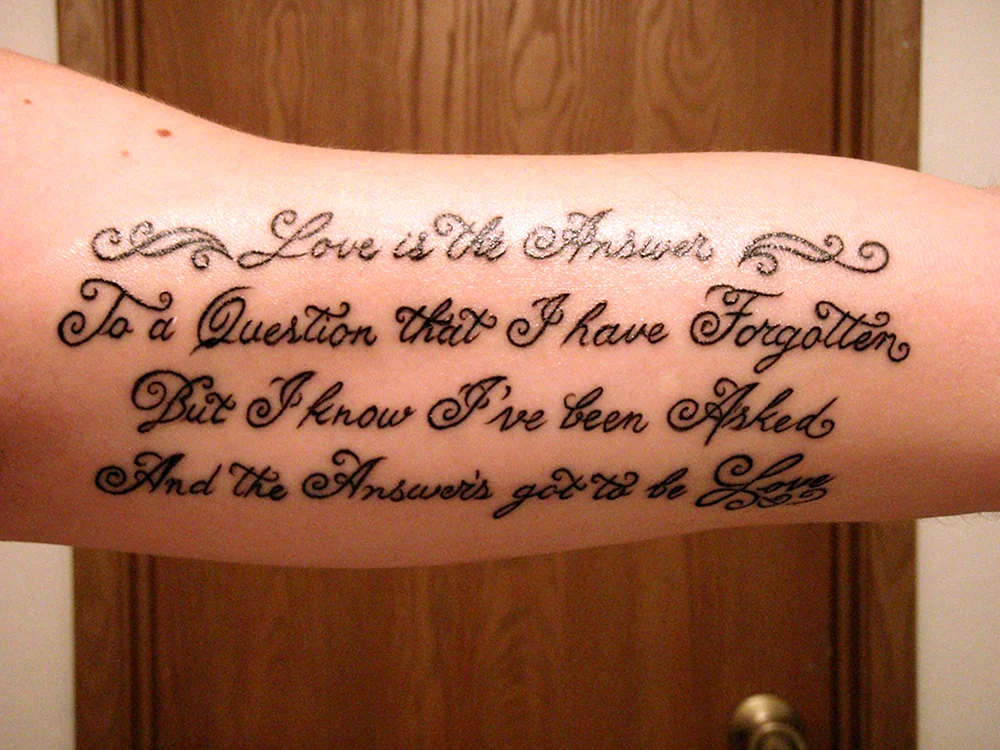 Lettering Tattoo Arm