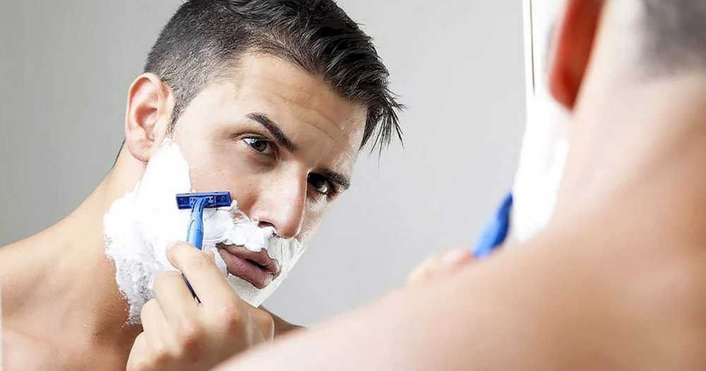 Men shaving before Shower