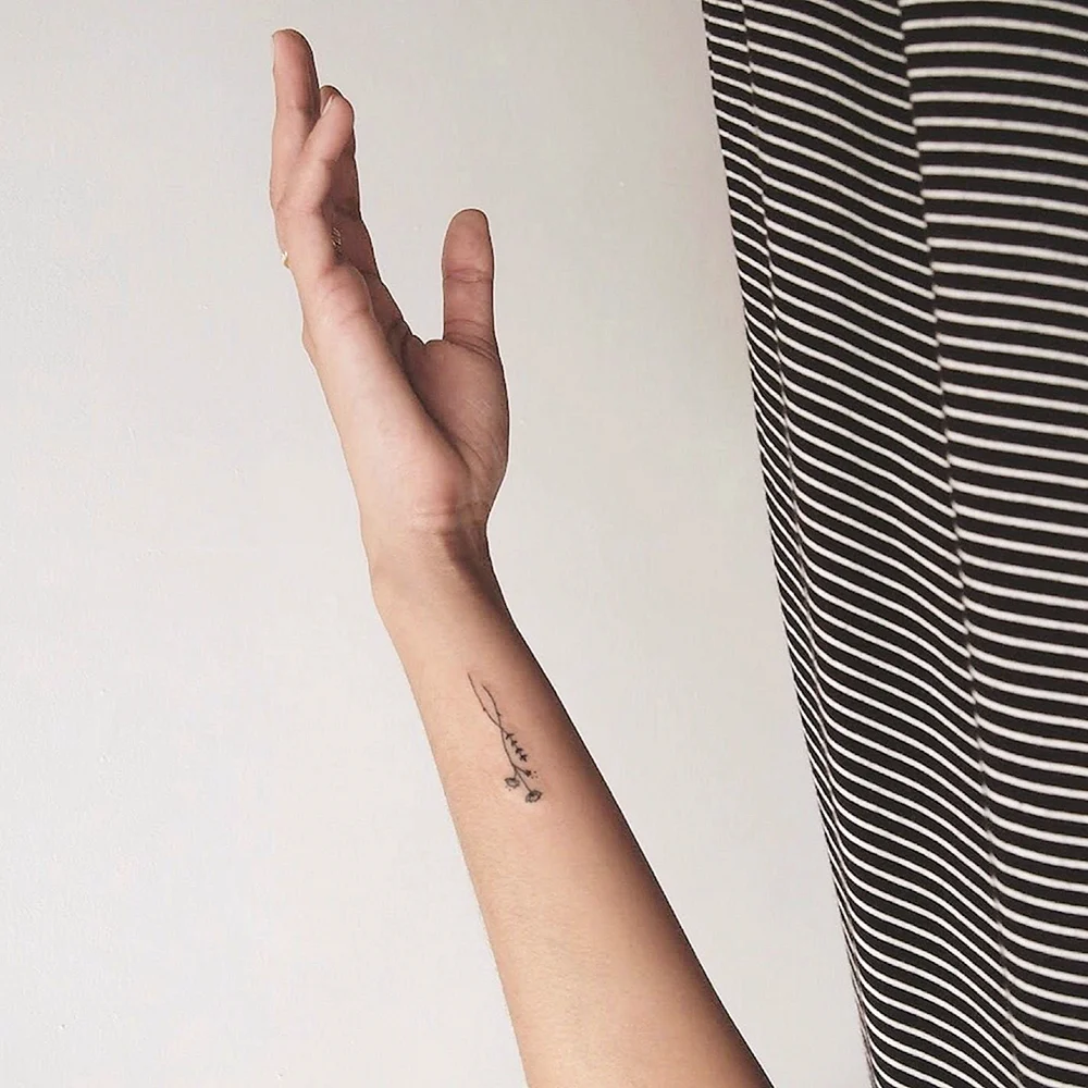 Minimalist hand Tattoo