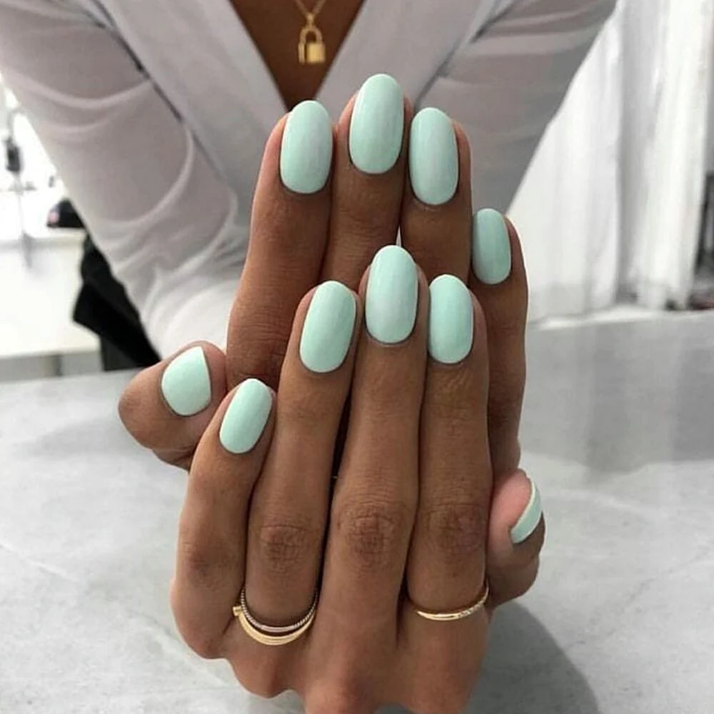 Oval Light Color Nails with Design