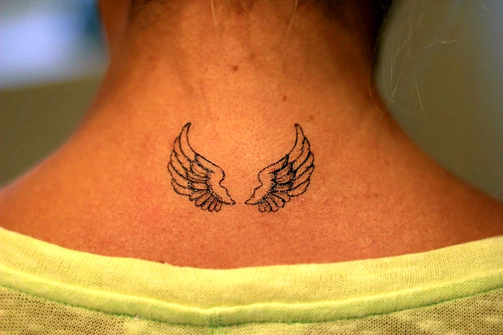 Small Angel Wing Tattoo
