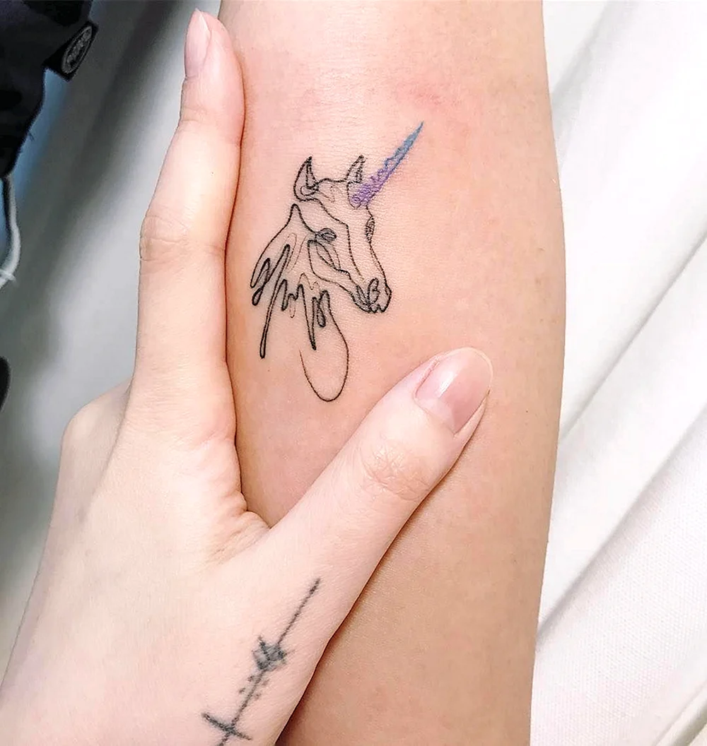 Small Unicorn Tattoo