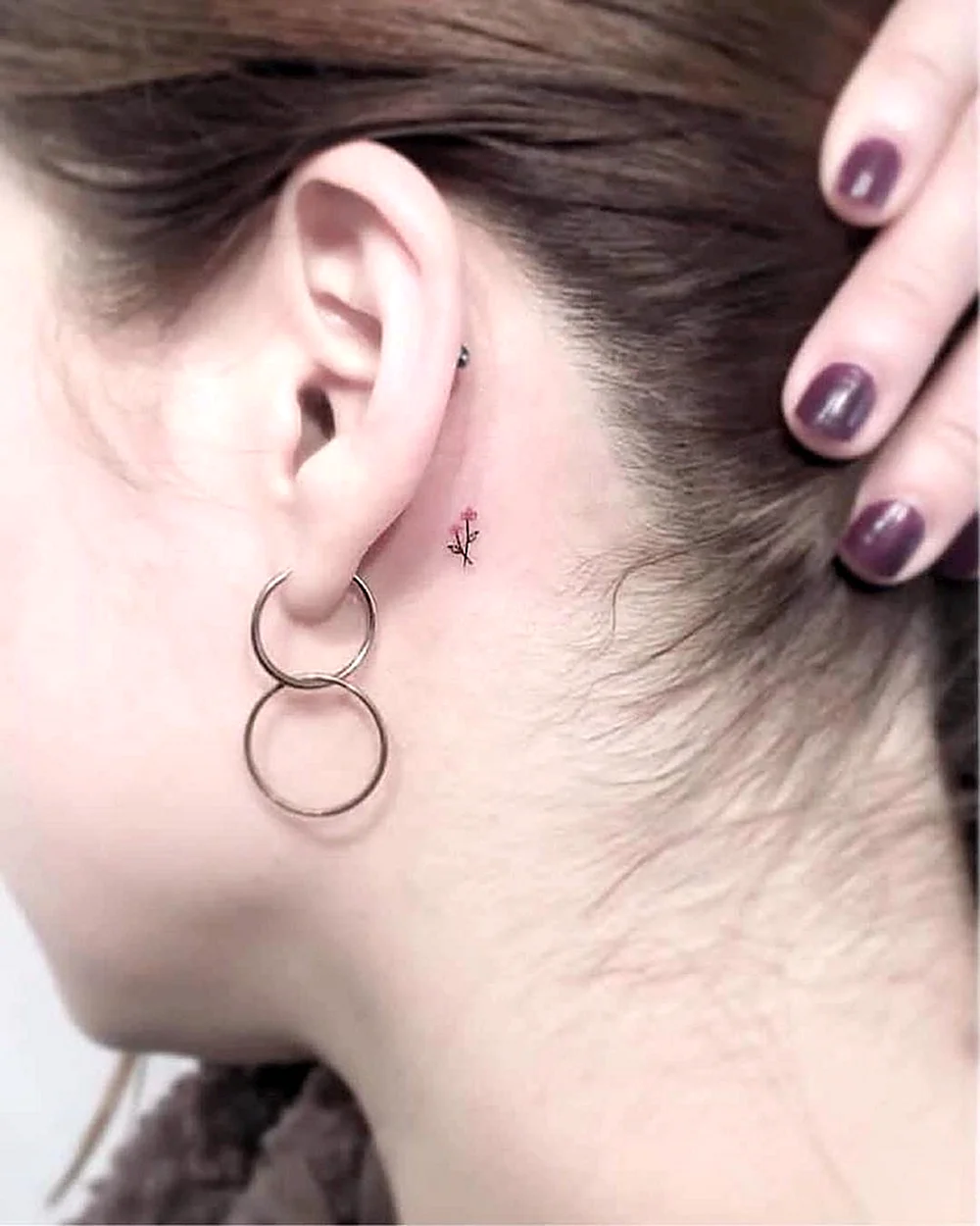 Tattoo inside the womans Ear