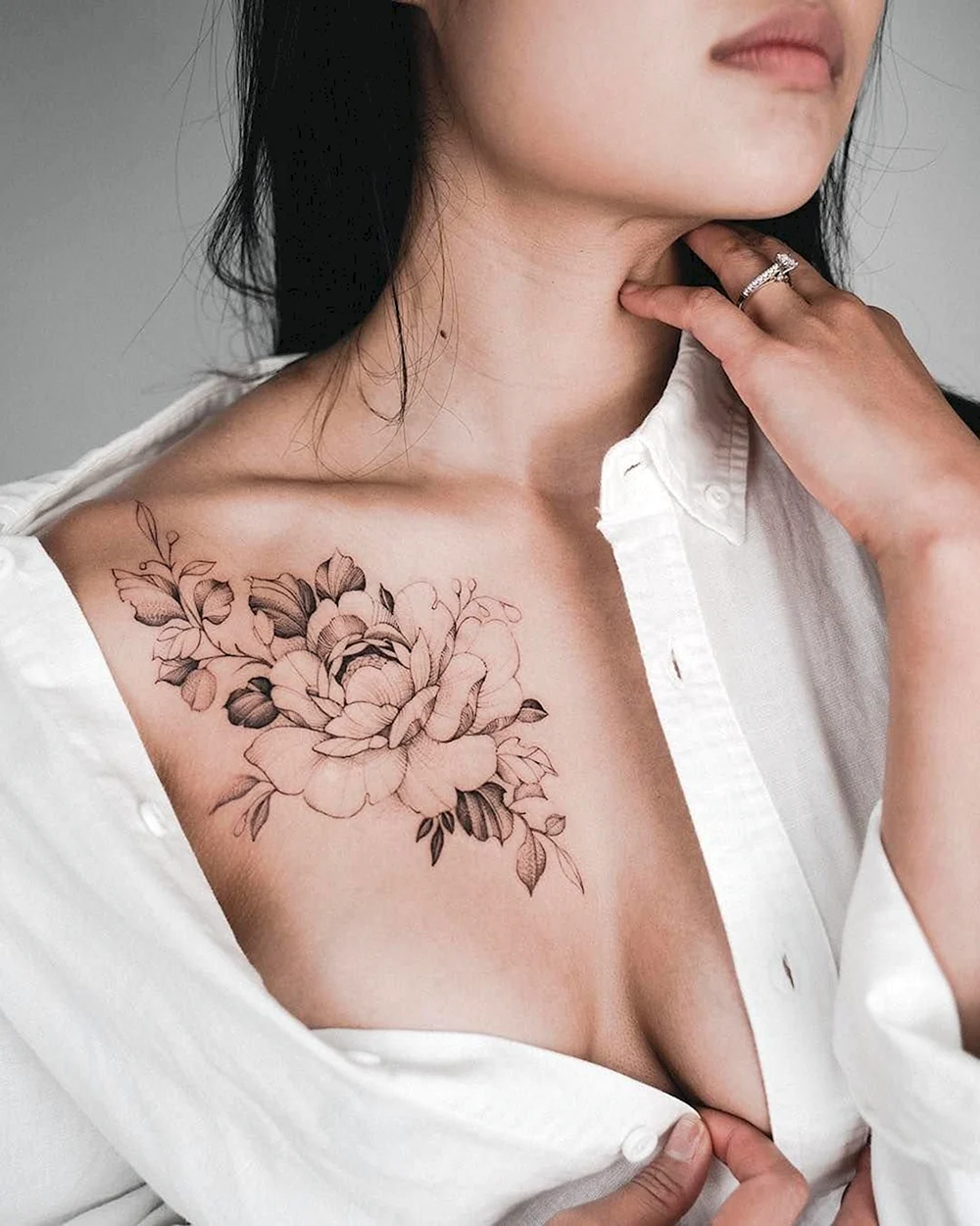 Tattoo on the woman Chest