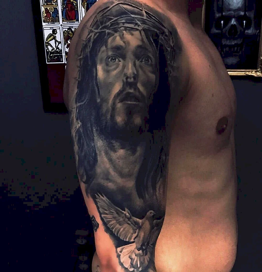 Татуировка Иисуса Христа у Месси