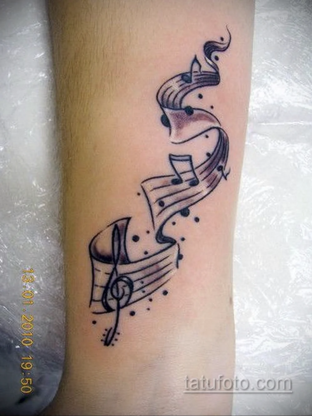 Traditional Music Note Tattoo