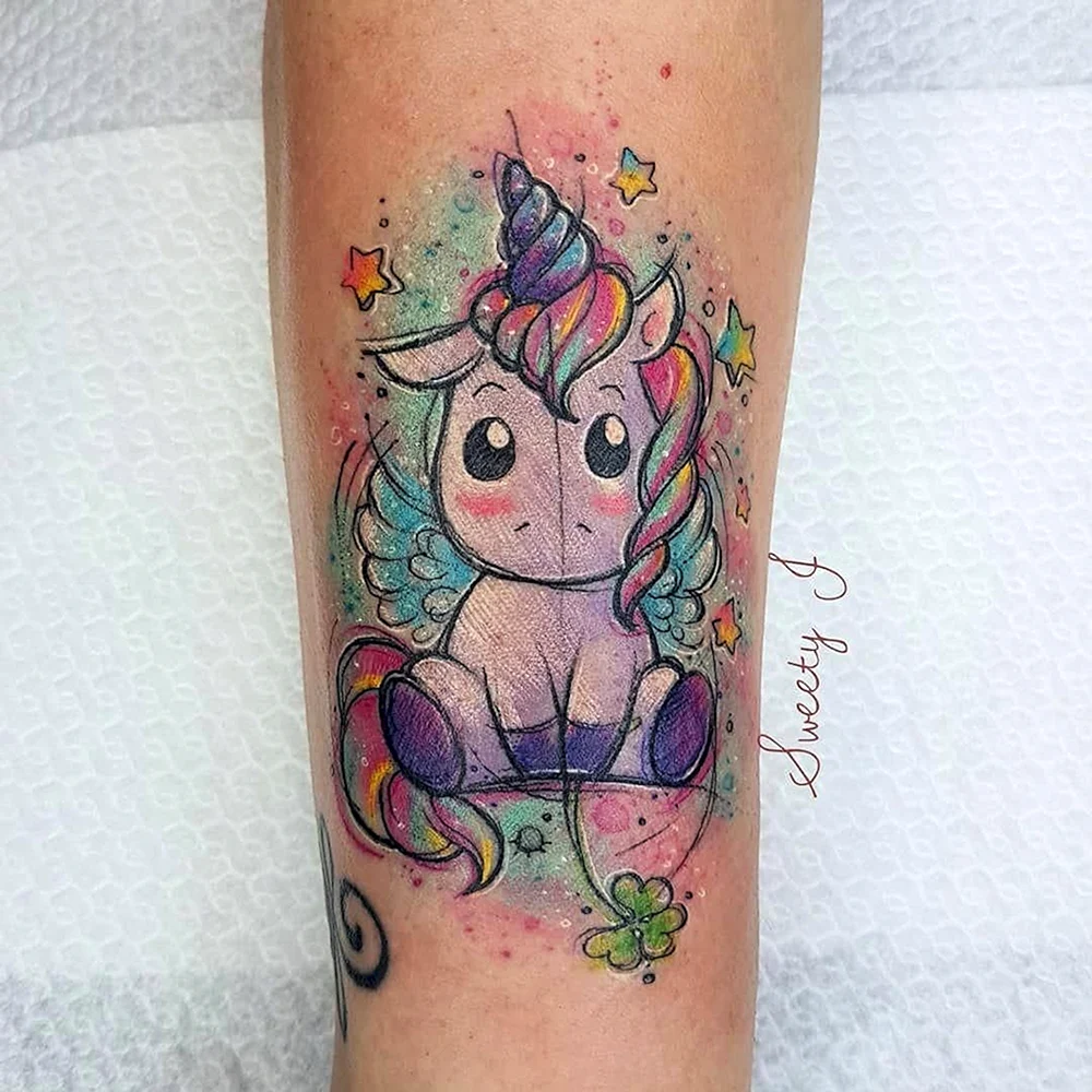 Unicorn tattoed Arm